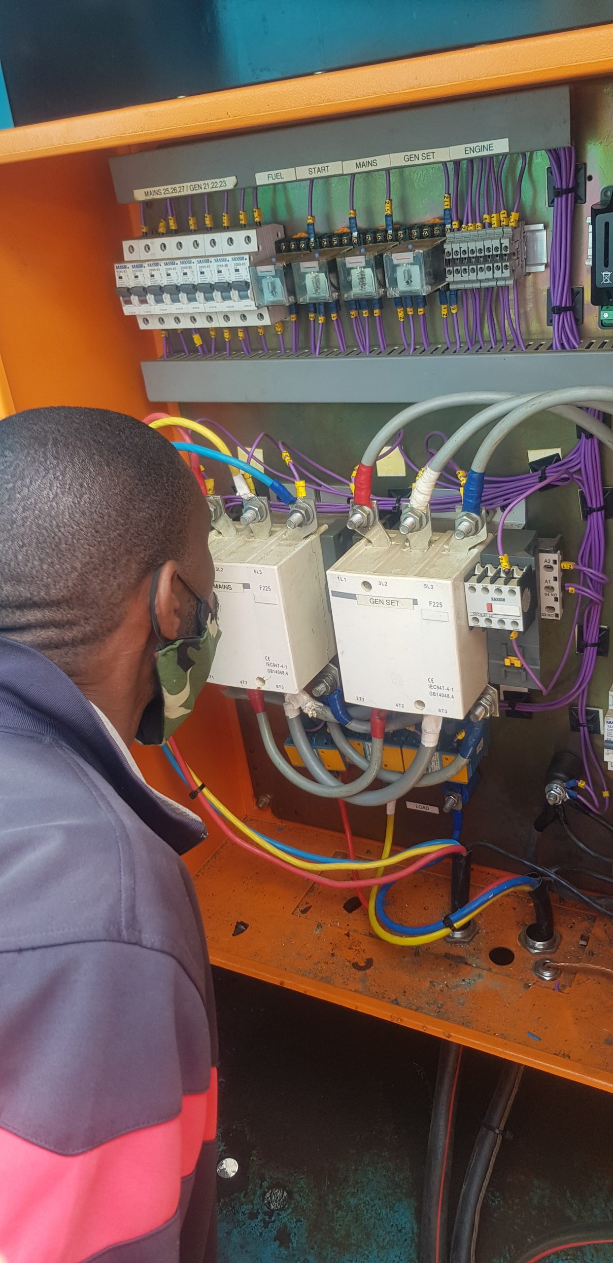 Home High-angle view of construction workers on a building site, engaging in construction work.