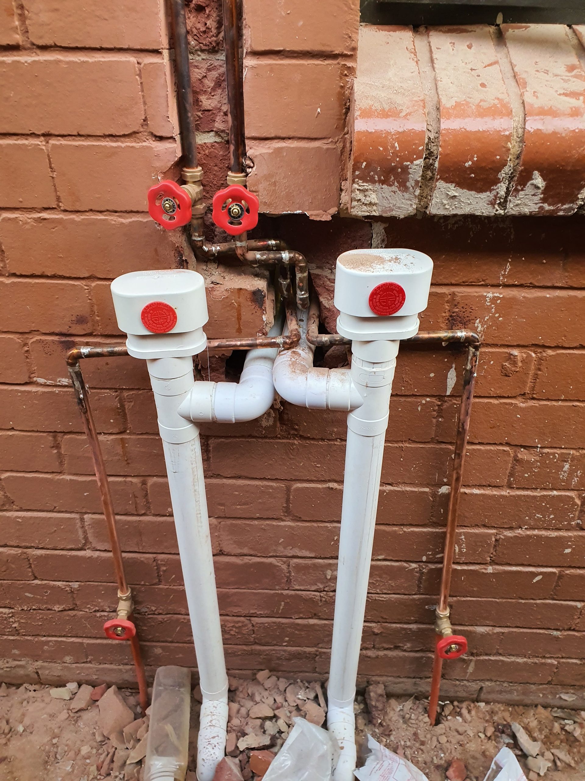 Home Renovation scene featuring ladder, frame, and tools against partially demolished walls.
